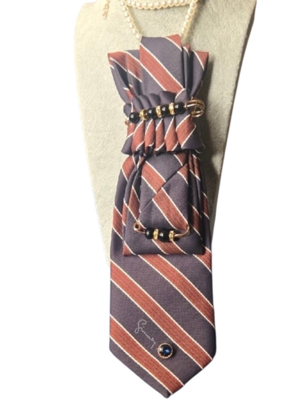3/$60 Striped Brown and Black Folded Cravat with Matching Gem And Pearl Details
